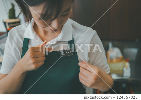 salesperson, shop assistant, cafeteria 124357025