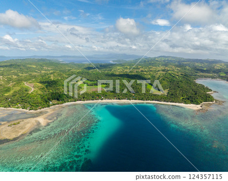 Tropical beach with azure sea water with coral reefs. Santa Fe, Tablas, Romblon. Philippines. Tropical beach with azure sea water with coral reefs. Santa Fe, Tablas, Romblon. Philippines. 124357115
