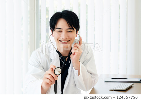 Doctor who places a stethoscope Doctor who places a stethoscope 124357756