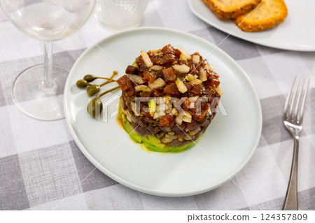 Tuna tartare appetizer served on platter Tuna tartare appetizer served on platter 124357809