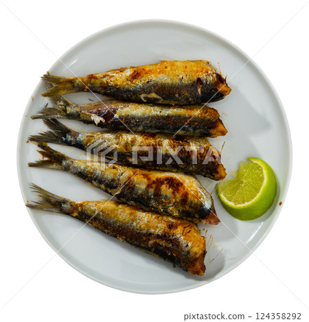 Fried sardine fish served on plate 124358292
