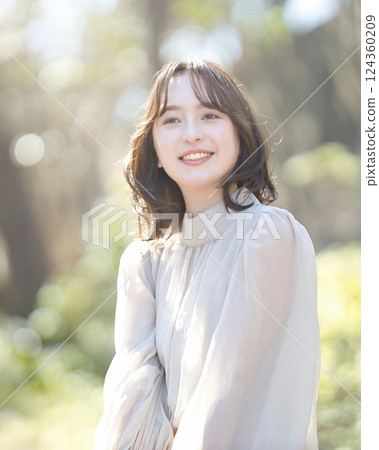 Female college student walking on campus 124360209
