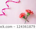 Carnation and pink ribbon 124361879