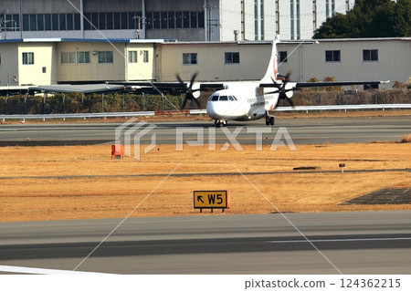 Osaka International Airport JAL propeller plane airplane takeoff preparation sky park 124362215