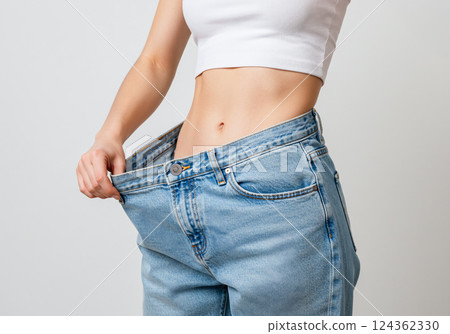 A woman who dramatically improved her body shape through dieting A woman who dramatically improved her body shape through dieting 124362330
