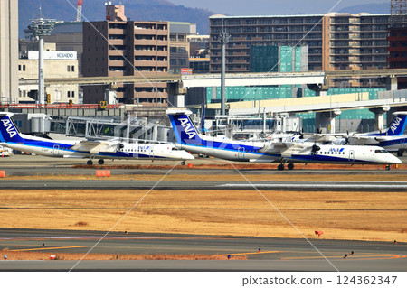 Osaka International Airport ANA Bombardier DHC8-Q400 Propeller Aircraft Takeoff Ready Sky Park Osaka International Airport ANA Bombardier DHC8-Q400 Propeller Aircraft Takeoff Ready Sky Park 124362347