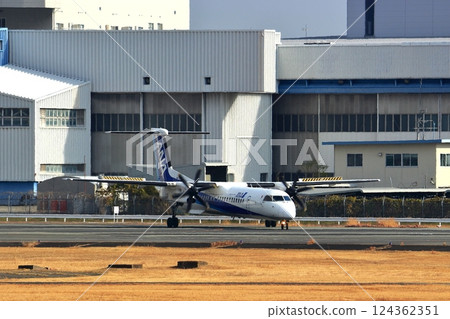 Osaka International Airport ANA Bombardier DHC8-Q400 Propeller Aircraft Takeoff Ready Sky Park Osaka International Airport ANA Bombardier DHC8-Q400 Propeller Aircraft Takeoff Ready Sky Park 124362351