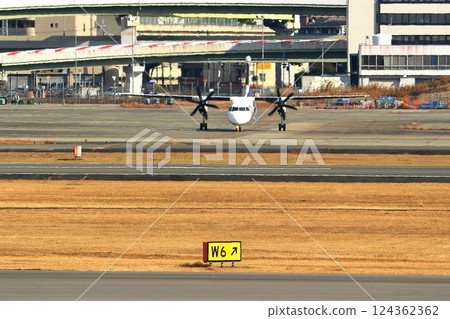 Osaka International Airport ANA Bombardier DHC8-Q400 Propeller Aircraft Takeoff Ready Sky Park Osaka International Airport ANA Bombardier DHC8-Q400 Propeller Aircraft Takeoff Ready Sky Park 124362362