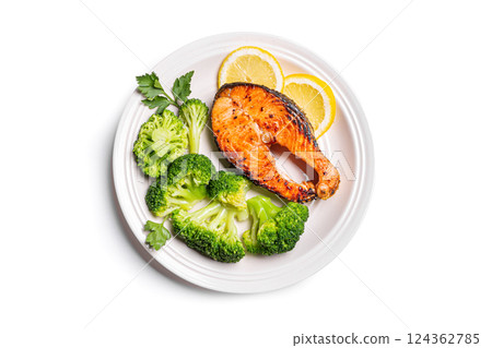 Roasted Salmon fish steak with steamed broccoli vegetables 124362785