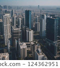 Photorealistic illustration of aerial view of the buildings of a fictional city 124362951