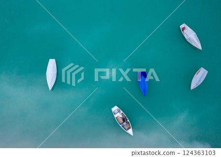 Drone image with fishing boats on Sylvenstein Lake, in Upper Bavaria, Germany 124363103
