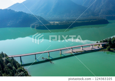 Drone image with the bridge and Lake Sylvenstein in Bavarian Alps, Germany Drone image with the bridge and Lake Sylvenstein in Bavarian Alps, Germany 124363105