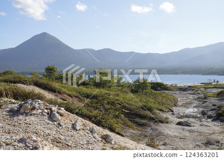 The desolate rock face of Mount Osore, Lake Usori, and Mount Ojin 124363201