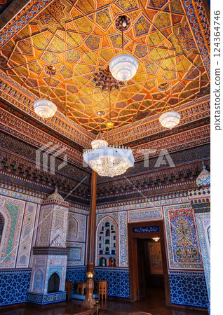 beautiful interior with painted wooden carved ceiling and walls in the Museum of Art of Uzbekistan with traditional Uzbek patterns and oriental ornaments in palace in Tashkent 124364746