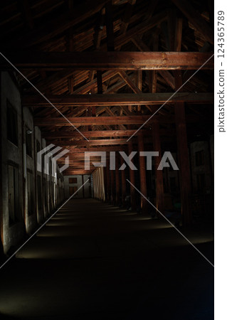 Dark wooden warehouse interior 124365789