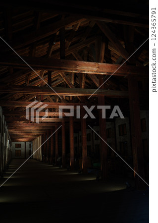 Dark wooden warehouse interior 124365791