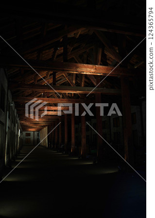 Dark wooden warehouse interior 124365794