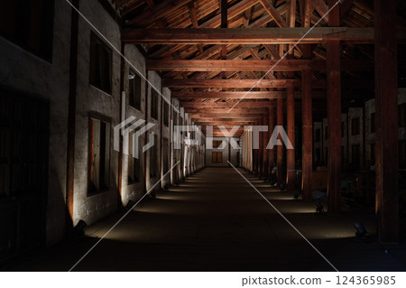 Dark wooden warehouse interior 124365985