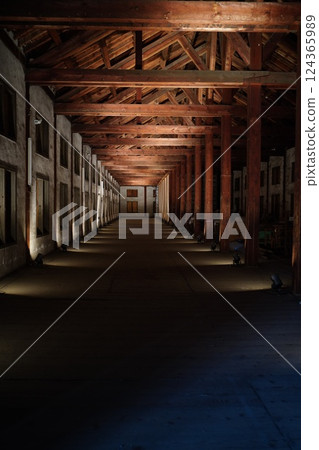 Dark wooden warehouse interior 124365989