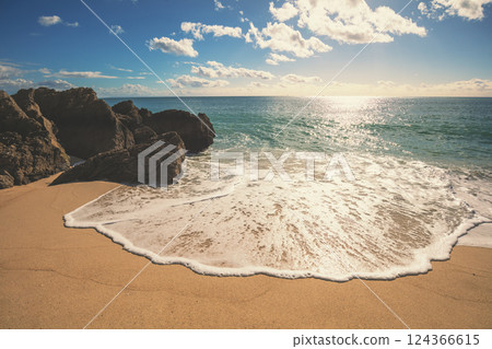 Rocky seascape on a sunny day, view of sunny bay. Galapinhos beach, Setubal, Portugal 124366615