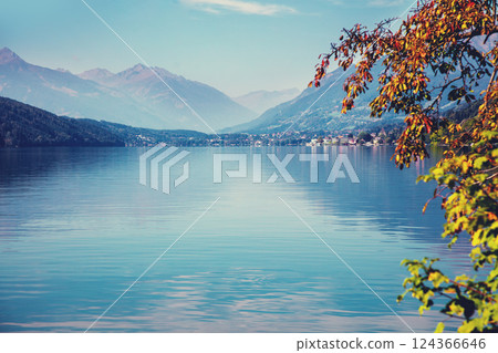 View of a mountain lake in autumn. Lake Millstatt, Austria, Europe View of a mountain lake in autumn. Lake Millstatt, Austria, Europe 124366646