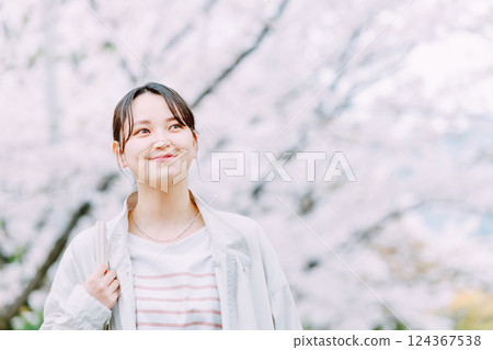 Cherry blossom and young woman Cherry blossom and young woman 124367538