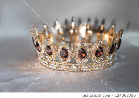 Luxury golden crown with rauchtopaz, garnets and diamonds 124368380