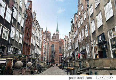 Mariacka Street in Gdansk, Poland is a small cobblestone street lined on both sides with amber shops, a local specialty. 124370037