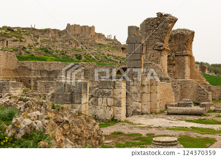 Remains of Licinian Baths in the ancient roman city of Dougga. Tunisia Remains of Licinian Baths in the ancient roman city of Dougga. Tunisia 124370359