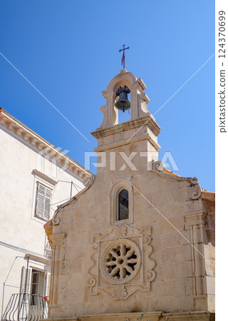 Chapel of St. John in Jelsa old town on the Adriatic island of Hvar in the county of Split-Dalmatia in Croatia 124370699