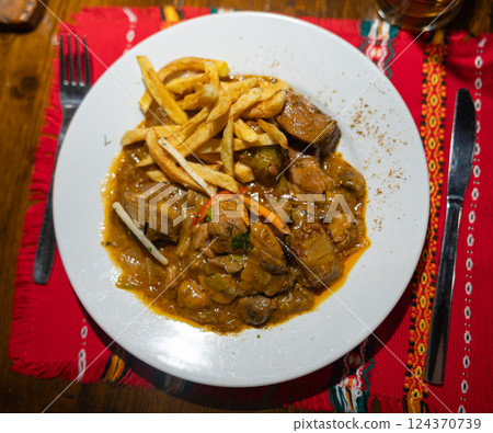 Pork with mushrooms and potatoes top view 124370739