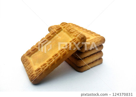 Indian biscuits stacked over white background 124370831