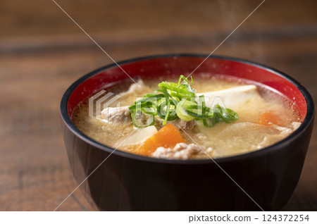 Miso soup with pork and vegetables Miso soup with pork and vegetables 124372254