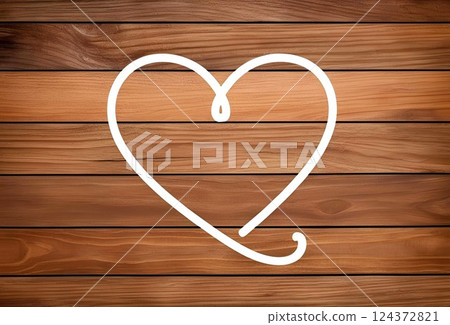 A simple white heart mark painted on a wooden board 124372821