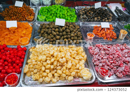 dried fruits and various oriental sweets on Asian market in Asia in Vietnam dried fruits and various oriental sweets on Asian market in Asia in Vietnam 124373052