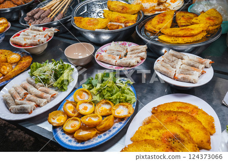 Vietnamese food at the Asian night market on street in Vietnam in Asia in Da Nang Vietnamese food at the Asian night market on street in Vietnam in Asia in Da Nang 124373066