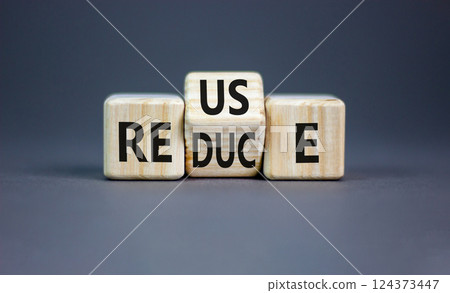 Reuse or reduce symbol. Concept words Reuse Reduce on wooden block. Beautiful grey table grey background. Business reuse or reduce concept. Copy space. Reuse or reduce symbol. Concept words Reuse Reduce on wooden block. Beautiful grey table grey background. Business reuse or reduce concept. Copy space. 124373447