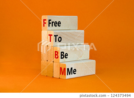 FTBM Free To Be Me symbol. Concept word FTBM Free To Be Me on beautiful wooden blocks. Beautiful orange background. Business motivational FTBM Free To Be Me concept. Copy space. FTBM Free To Be Me symbol. Concept word FTBM Free To Be Me on beautiful wooden blocks. Beautiful orange background. Business motivational FTBM Free To Be Me concept. Copy space. 124373494