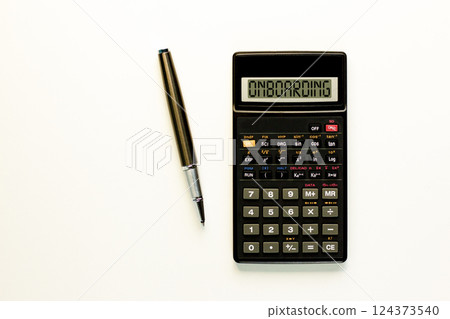 Onboarding success symbol. Concept word Onboarding on beautiful black calculator. Beautiful white paper background. Beautiful black pen. Business onboarding success concept. Copy space. 124373540