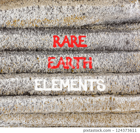Rare earth elements symbol. Concept words Rare earth elements on beautiful grey stone wall. Beautiful grey mountain stone wall background. Business and rare earth elements concept. Copy space. Rare earth elements symbol. Concept words Rare earth elements on beautiful grey stone wall. Beautiful grey mountain stone wall background. Business and rare earth elements concept. Copy space. 124373611