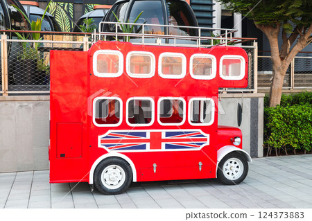 Funny mini car for driving tourists along the embankment 124373883