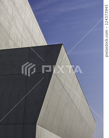 Modern Building Cement tiles Modern building Facade Geometric shape Exterior Architecture details 124373945