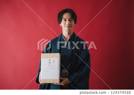 Celebration gift - Man delivering gratitude 124374588