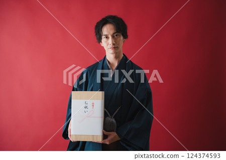 Celebration gift - Man delivering gratitude 124374593