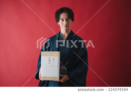 Celebration gift - Man delivering gratitude 124374594