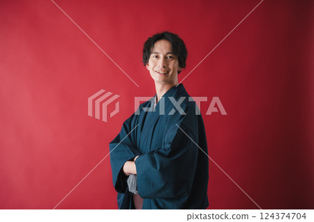 Confidence and smiles – a portrait of a beautiful woman in traditional Japanese clothing 124374704