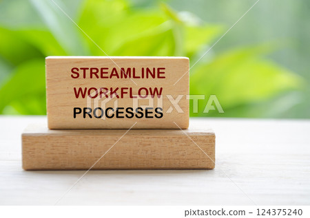 Simplify Workflow Processes text on wooden blocks representing continuous Improvement approach 124375240