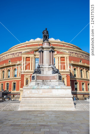 This outdoor monument honors Albert, Prince Consort, commemorating the Great Exhibition of 1851. Located south of Royal Albert Hall, it showcases intricate design against a clear blue sky. 124375525
