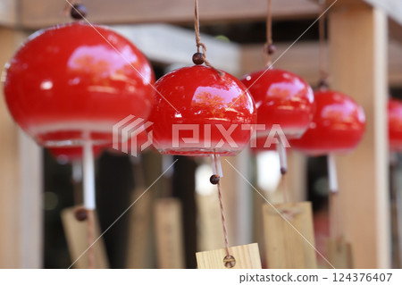 Red glass wind chimes 124376407