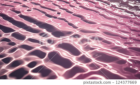 Pink water surface creating a relaxing and serene atmosphere 124377669